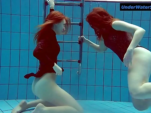 Two steaming teenies underwater