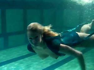 Blond Feher with large hard orbs underwater
